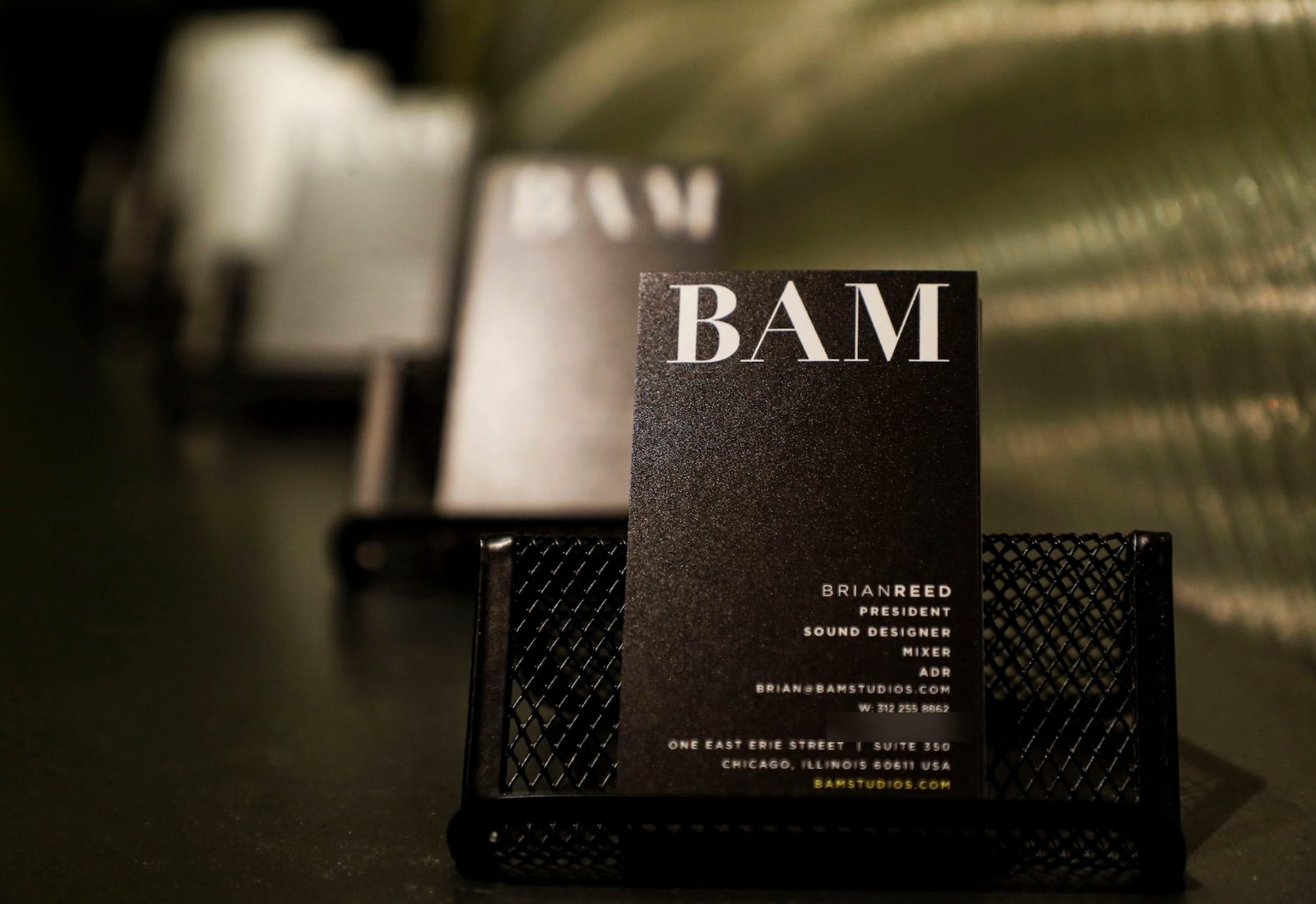 BAM Studios business cards on the front desk