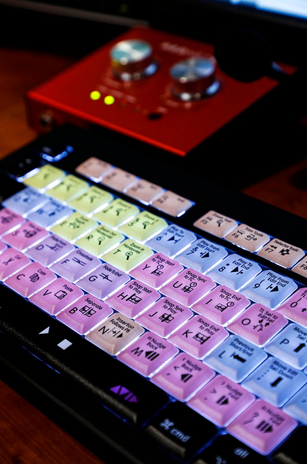A Pro Tools shortcut keyboard beside a Focusrite preamp